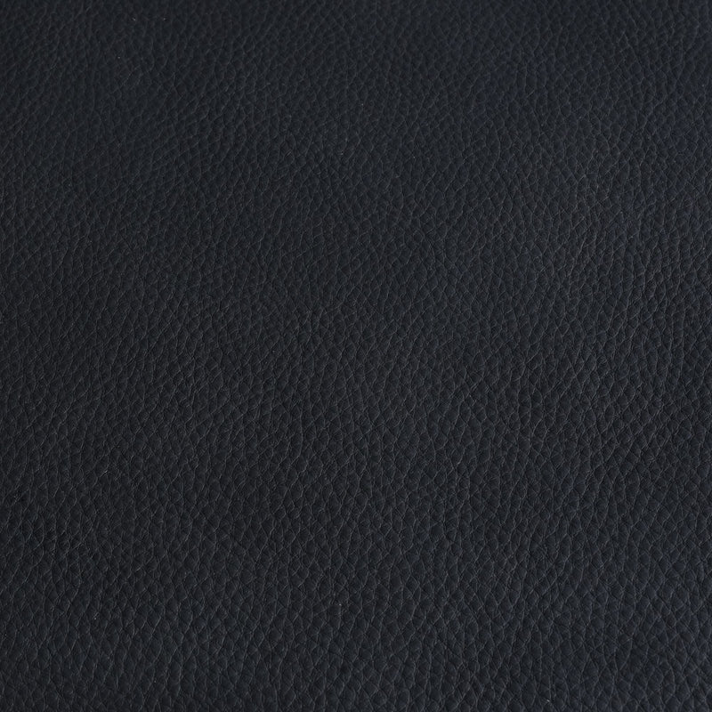 Close-up high-resolution seamless black leather texture with fine pebble grain, ideal for luxury upholstery, furniture, and product backgrounds.