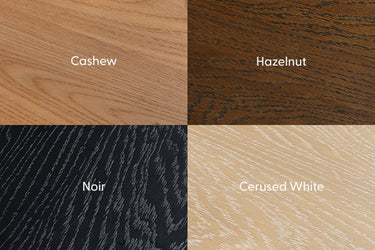 Four stained wood finish samples labeled Cashew, Hazelnut, Noir, and Cerused White displaying distinct grain patterns and color options for furniture, cabinetry, and flooring
