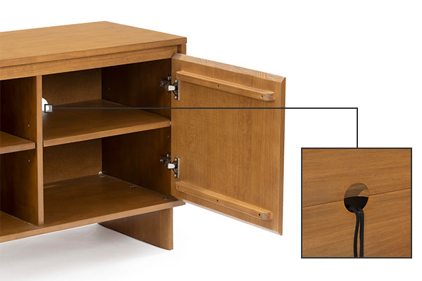 Light-wood media console cabinet with open door, adjustable interior shelves and built-in cable management hole (cable grommet) for organizing TV and electronics