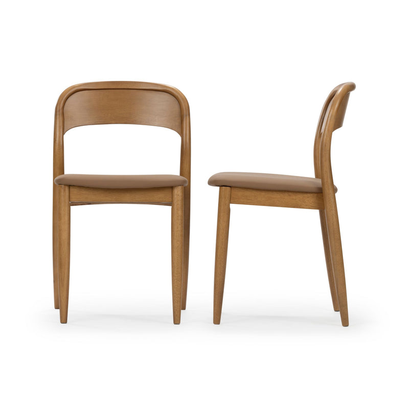 Set of two mid-century modern oak dining chairs with curved wooden backrests and tan upholstered seats on white background