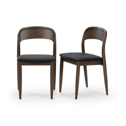 Set of 2 mid-century modern dark walnut dining chairs with curved wooden backs and black upholstered seats
