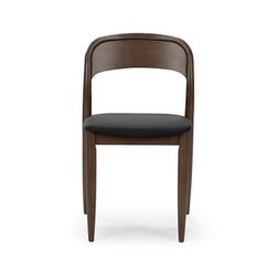 Mid-century modern walnut dining chair with curved arched back and black leather upholstered seat, solid wood frame, front view on white background