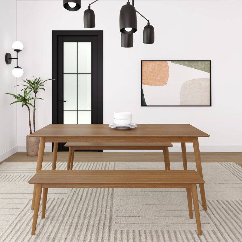 Modern dining room interior with wooden table, benches, minimalist lighting, abstract wall art, and a potted plant.