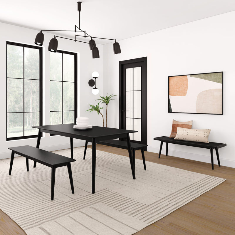 Modern dining room featuring minimalist black dining table with matching benches, large windows, and abstract wall art for stylish home decor.