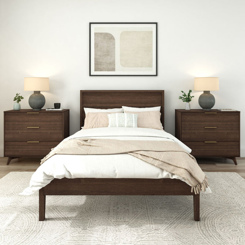 Modern bedroom with wooden bed and matching nightstands, beige bedding, and contemporary artwork.