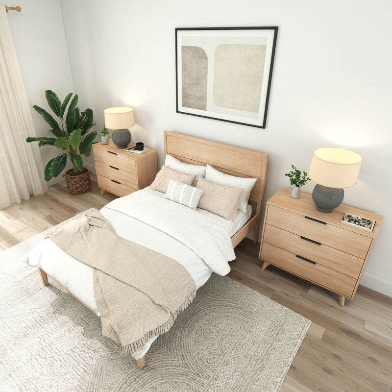 Modern minimalist bedroom with wooden furniture, neutral bedding, and natural light.