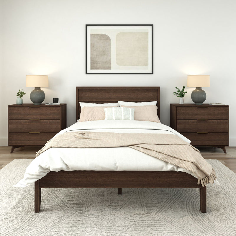 Modern bedroom with wooden bed and nightstands, white bedding, and neutral decor accents.