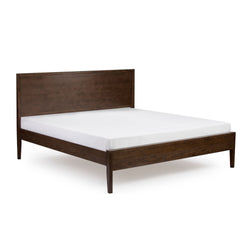 Dark brown wooden platform bed frame with minimalist paneled headboard and white mattress on white background, modern bedroom furniture