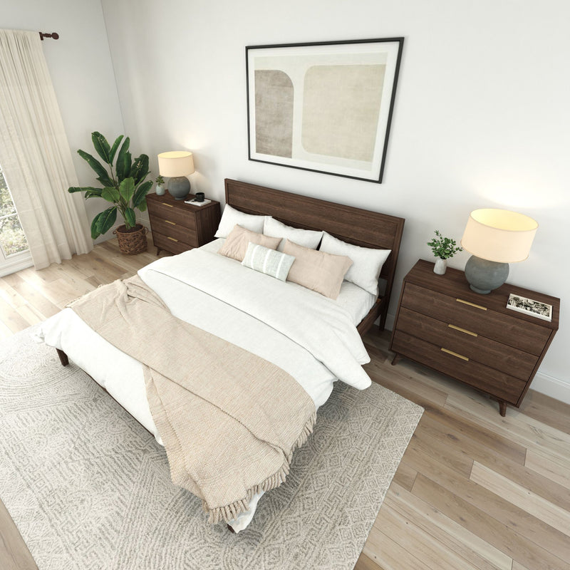 Cozy modern bedroom with wooden furniture and stylish neutral decor.