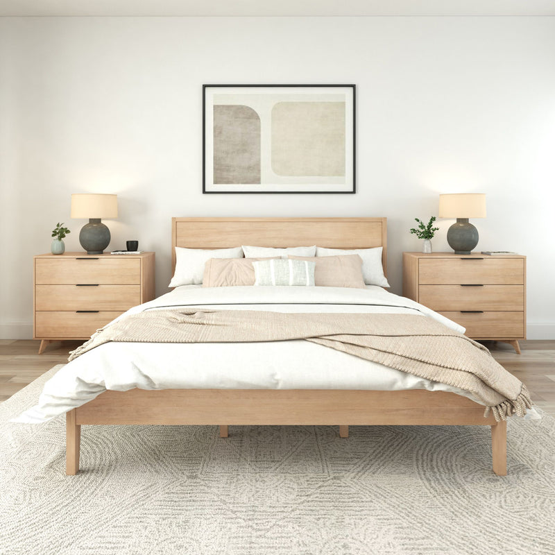 Modern minimalist bedroom with light wood furniture, neutral bedding, and abstract wall art.