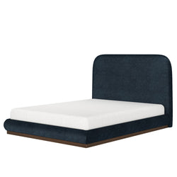 Modern dark blue upholstered platform bed with white mattress and sleek wood base.