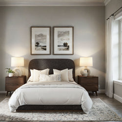 Elegant bedroom with modern decor, featuring a stylish bed, wooden nightstands, and framed artwork, creating a cozy and inviting atmosphere.