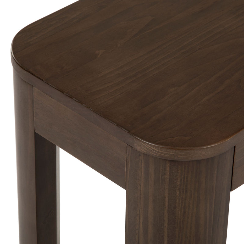 Dark wooden table corner with smooth finish and sturdy legs.