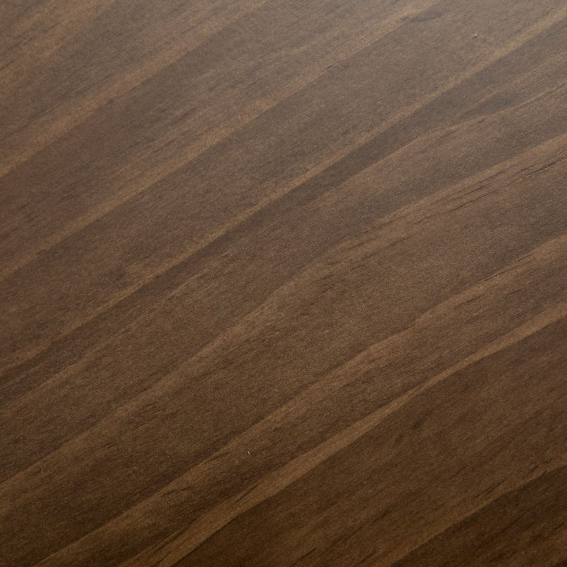 Close-up of a textured wood grain surface with natural brown tones.