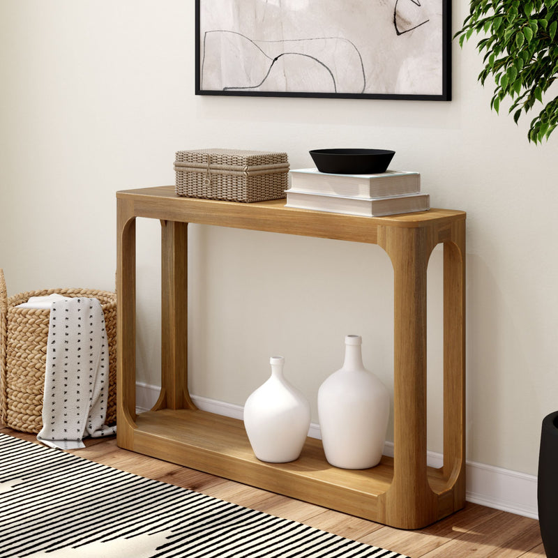 Modern wooden console table with decorative white vases, woven basket, and minimalist decor in a stylish living room setting.