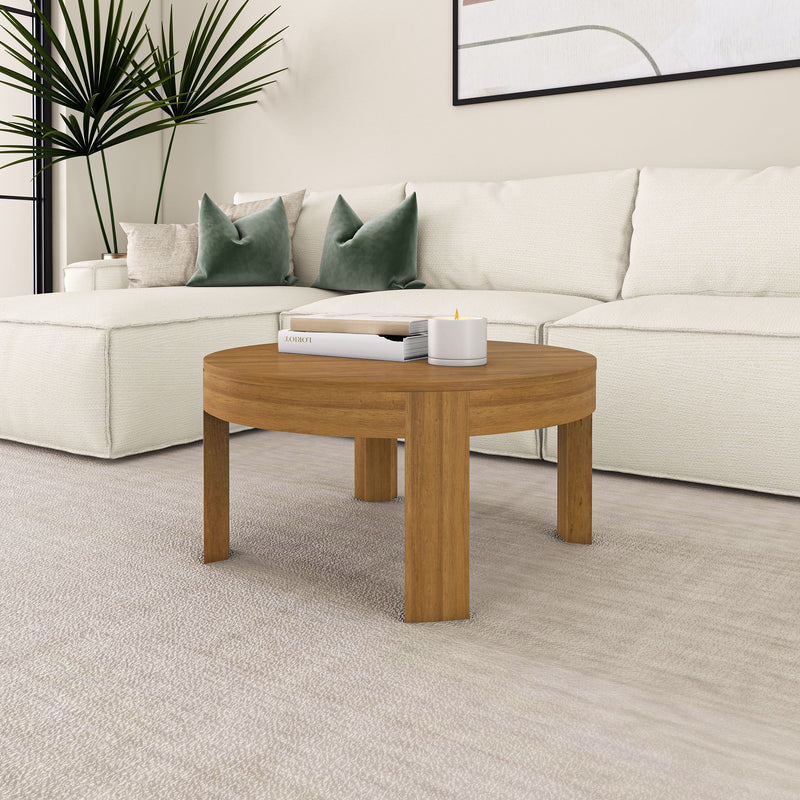 Elegant living room with a modern wooden coffee table and a cozy white sofa featuring green accent pillows.