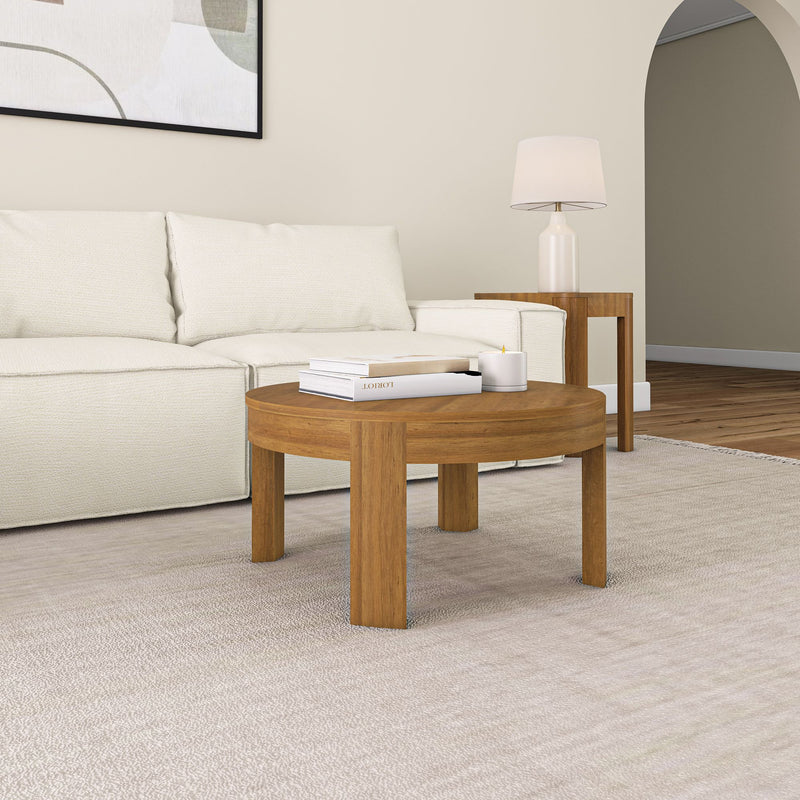 Modern living room with a wooden coffee table, white sofa, and elegant decor.