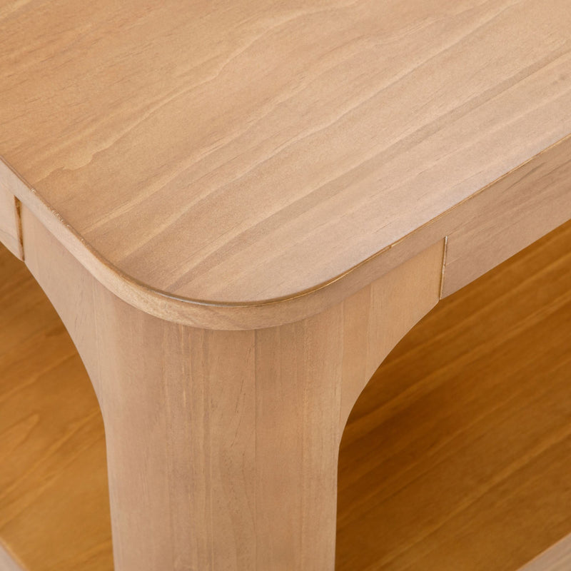 Corner view of a wooden table showcasing smooth finish and modern design.