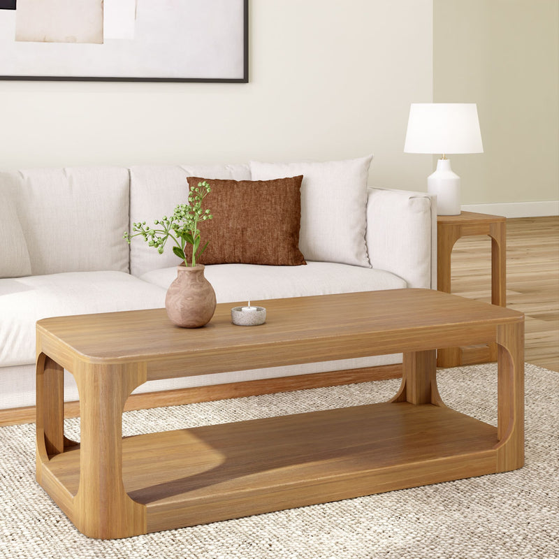 Modern living room with wooden coffee table, white sofa, and decorative pillows featuring minimalist home decor.