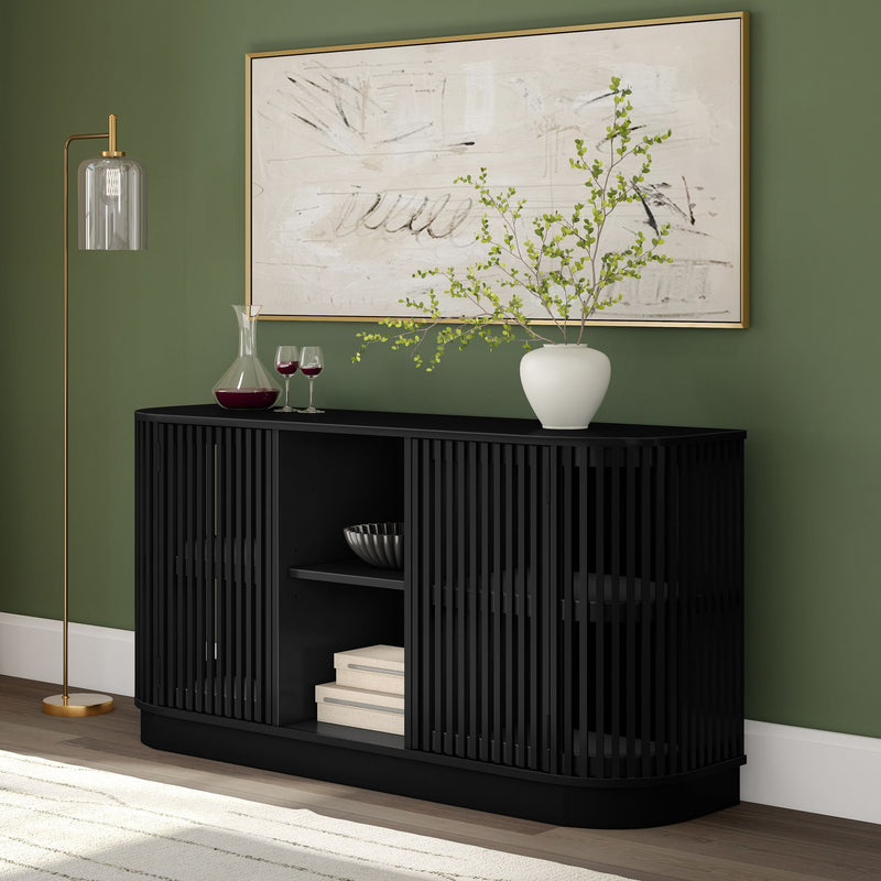 Modern living room interior with black sideboard, decor accessories, green wall, and abstract art.