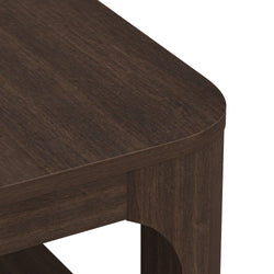 Dark wood corner table with rounded edges for modern home decor.