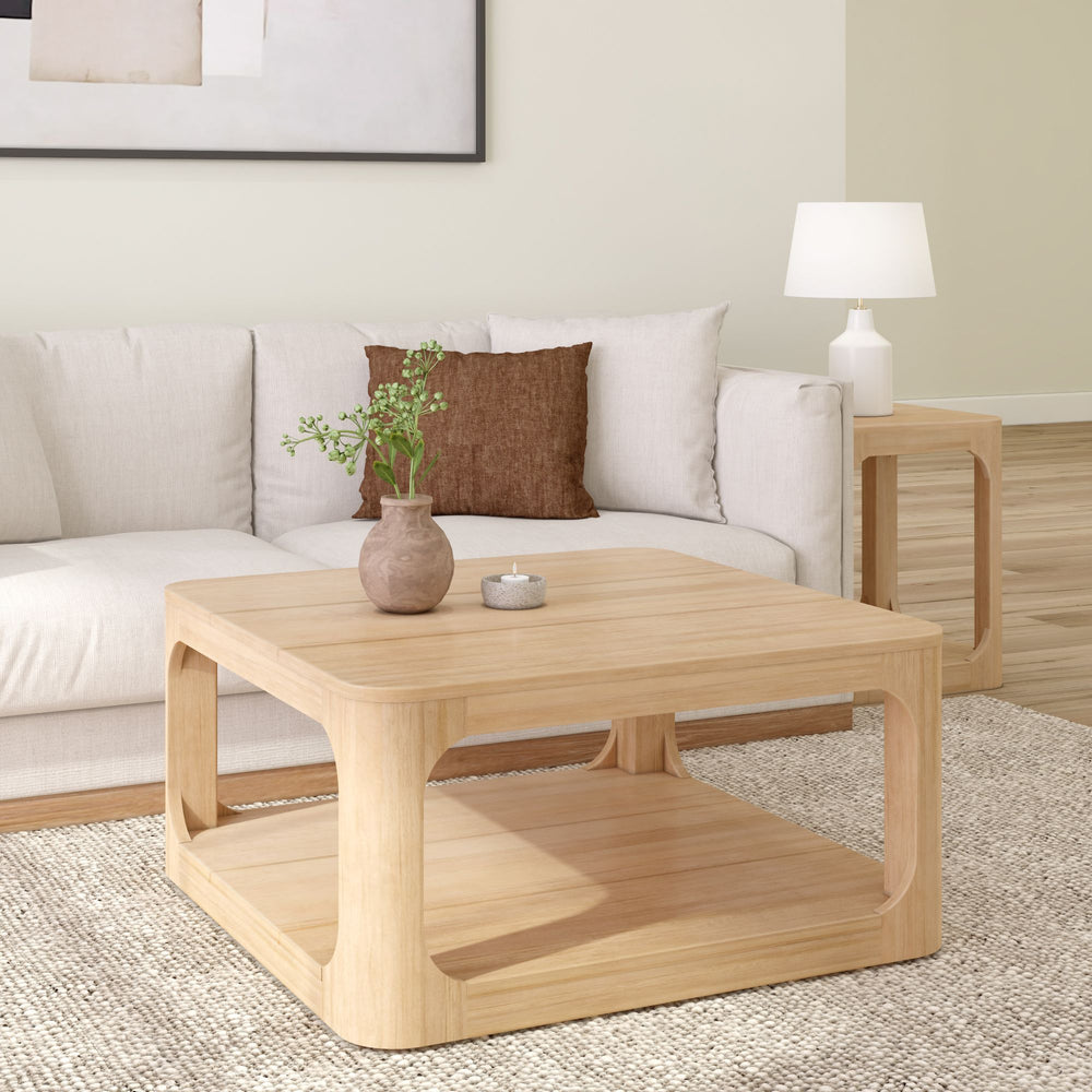 Modern living room with beige sofa, wooden coffee table, and decorative vase for contemporary home decor.
