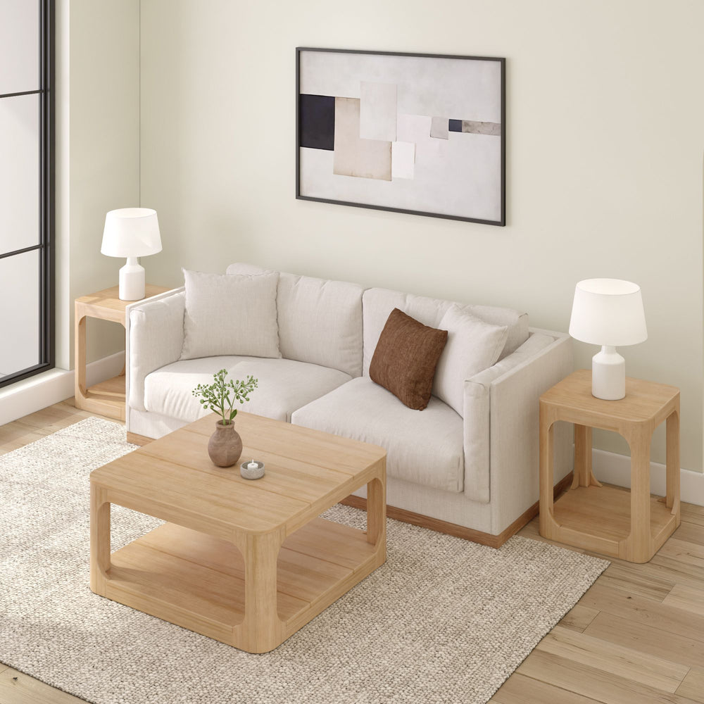 Elegant minimalist living room with a beige sofa and modern wooden furniture, featuring a contemporary abstract wall art and decorative elements.