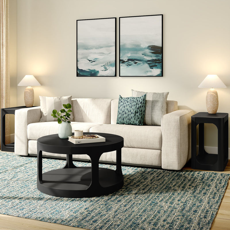 Modern living room with beige sofa, black round coffee table, blue textured area rug, abstract teal wall art, side tables with lamps, decorative pillows and potted plant
