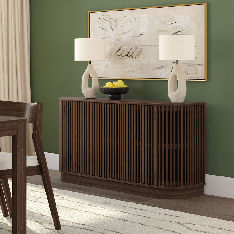 Contemporary wooden sideboard with modern table lamps and green wall art in a stylish dining room.