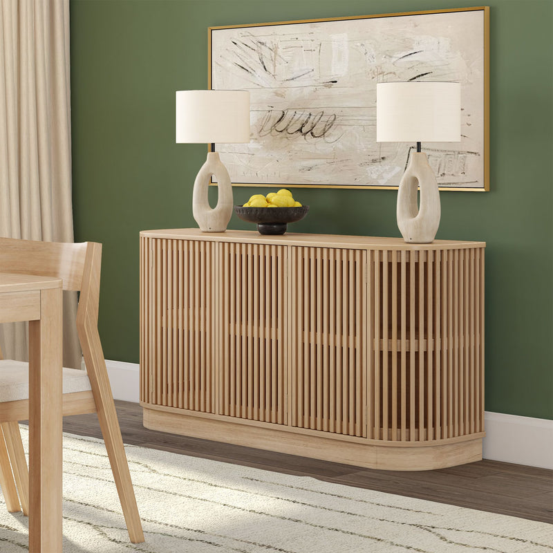Contemporary wooden sideboard with decorative lamps and wall art in a modern dining room setting.