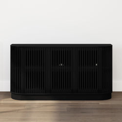 Modern matte black slatted media console TV stand with rounded corners on hardwood floor against a white wall