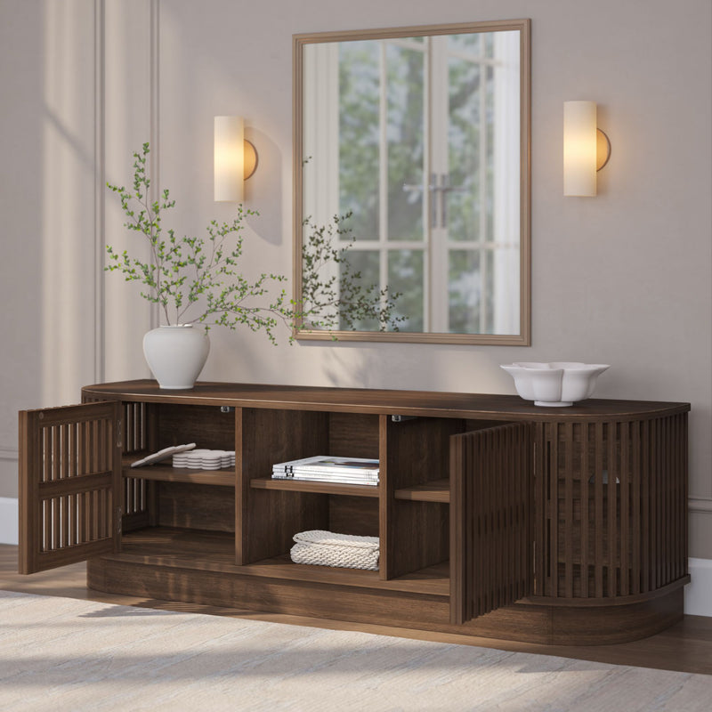 Contemporary wooden sideboard with open storage shelves and decorative mirror, featuring minimalist lighting and a modern vase for a stylish home interior.