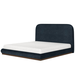 Modern dark blue upholstered bed frame with white mattress and wooden base.