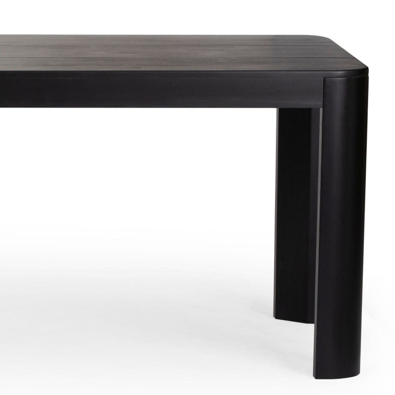 Sleek black modern dining table with rounded corners and sturdy legs.