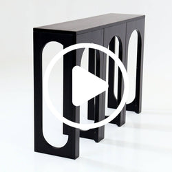 Black modern console table with arched cutout legs, minimalist black wood entryway/hallway table on white background