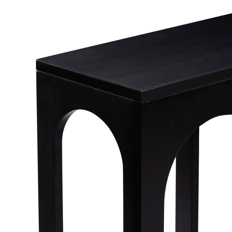 Modern black minimalist table corner with sleek design.