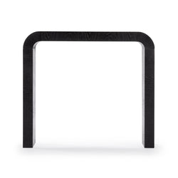 Minimalist black curved wooden console table with two rectangular legs, modern entryway accent on white background
