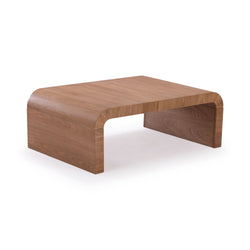 Modern low-profile curved-edge walnut coffee table with rounded corners and visible wood grain on white background