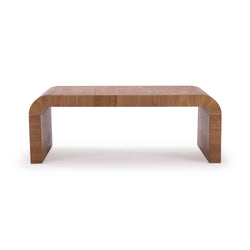 Minimalist modern curved-edge walnut wood bench coffee table with U-shaped legs and natural wood grain on white background