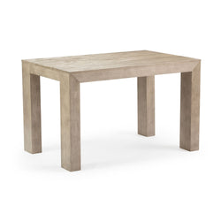Modern wooden dining table with a minimalist design in light oak finish.