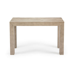 Minimalist wooden dining table with a natural finish.