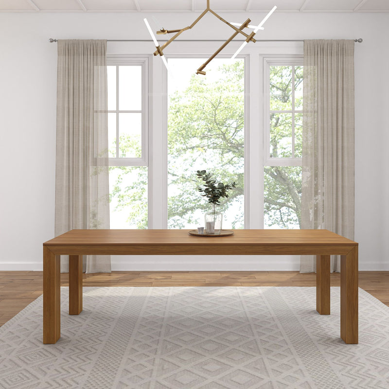 Modern dining room with wooden table, large windows, and contemporary chandelier.