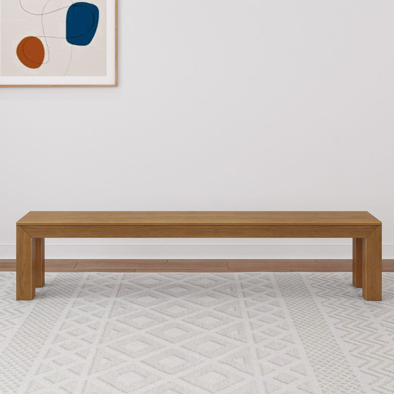 Minimalist wooden bench in modern living room with abstract wall art.