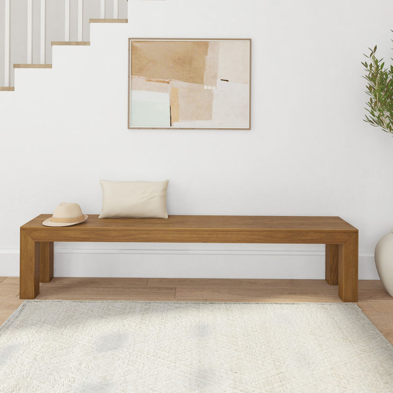 Wooden bench with cushion and hat in modern minimalist living room interior.