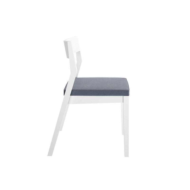 Modern white dining chair with gray cushion seat in profile view.