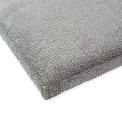 Gray textured seat cushion upholstery close-up.
