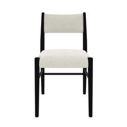 Modern black and white dining chair with plush upholstery.
