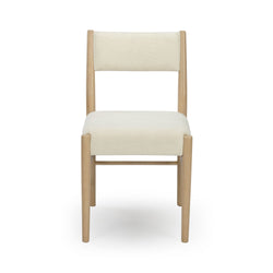 Modern cream upholstered dining chair with light natural wood frame and padded boucle seat and back — minimalist design