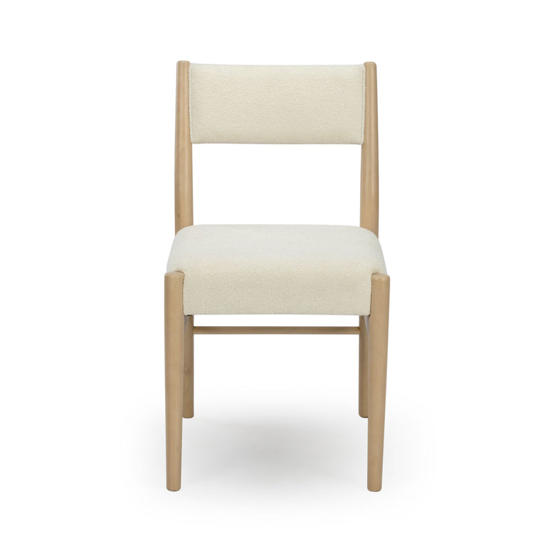 Modern cream upholstered dining chair with light natural wood frame and padded boucle seat and back — minimalist design