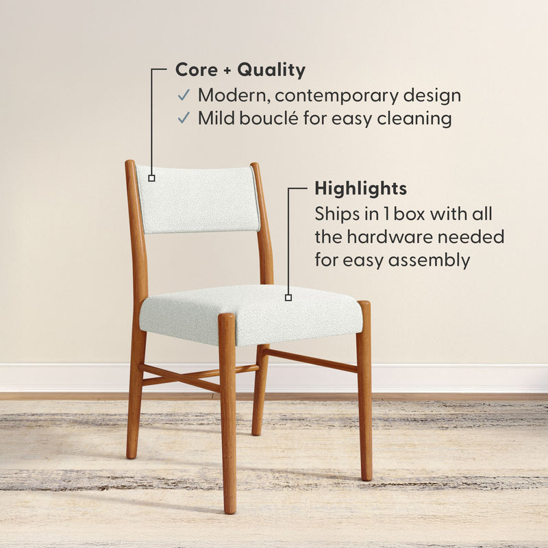 Mid-century modern wood frame dining chair with cream bouclé upholstery, contemporary design, easy-to-clean fabric, ships in one box with hardware for simple assembly.